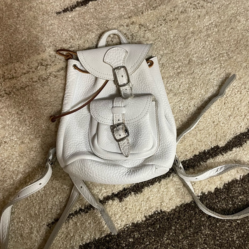 Roots pebbled leather mini backpack white